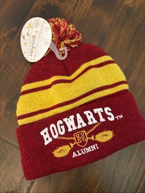 Warner Bros. Hogwarts Alumni Knit Pom Beanie in Maroon and Yellow